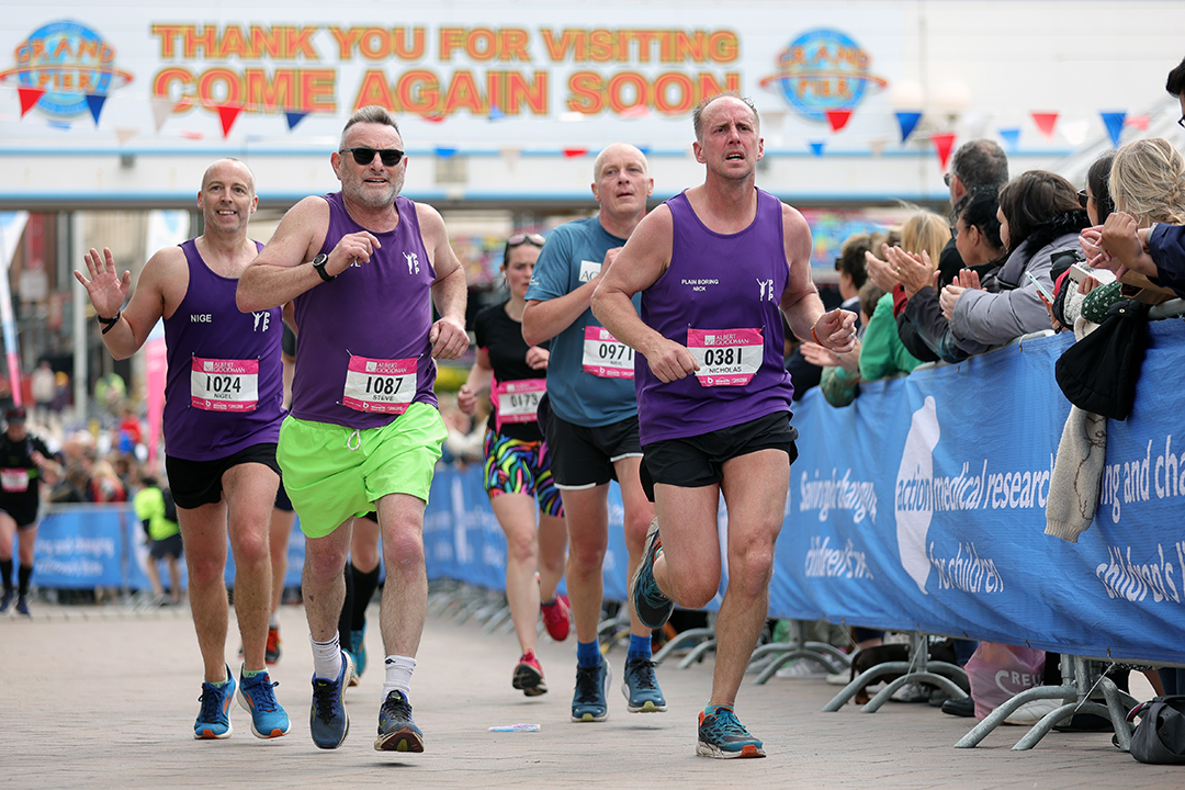 Runner approach the finish of the Weston Half Marathon